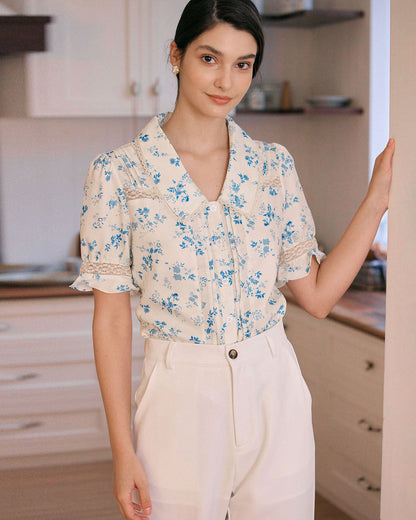Camisa floral plisada con detalles de encaje