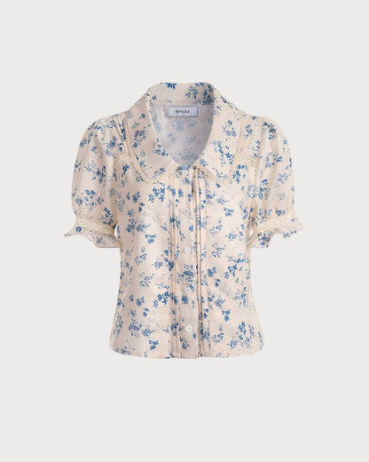 Camisa floral plisada con detalles de encaje