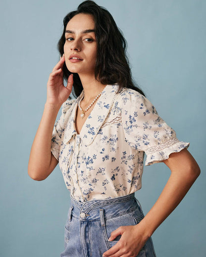 Camisa floral plisada con detalles de encaje