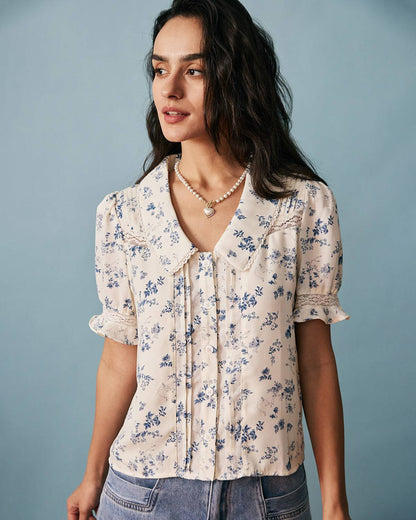 Camisa floral plisada con detalles de encaje