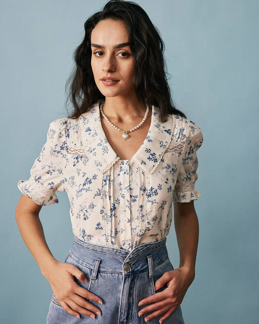 Camisa floral plisada con detalles de encaje